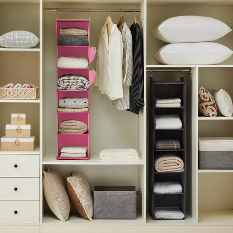 Hanging Closet Organizer With Bamboo Inserts And MDF Tops Pink Space Saving Shelves For Clothes And Accessories Ultra Durable Nonwoven Fabric Easy Access Wardrobe Storage For Quick Neat Organization in a closet.