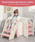 Pretty Darn Versatile Foldable Toddler Step Stool For Bathroom Sink And Kitchen Counter With Adjustable Height Settings And Safe Handles To Make Potty Training An Absolute Dream For Growing Kids In Soft Pink, toddler using it.