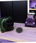 Durable 6 Pcs Nylon Polishing Wheel Set With 10mm Hole For Bench Grinder next to a green machine on a workshop table.
