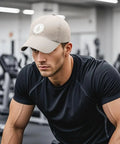 Man wearing No Crying On The Yacht Unisex Adjustable Hat For All Seasons, lightweight baseball style cap, indoor gym setting