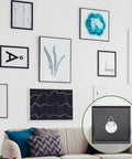 Gallery wall with art displays using 60 Piece Adhesive Plate Hangers No Nail Invisible Sticky Hooks Wall Round And Square Self Adhesive Frame Holders.