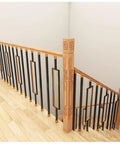 Top Shelf Metal Balusters and Staircase Spindles Measuring Thirty Seven Inches Tall for Deck Railings, Clean Black Gold Finish on Wooden Staircase.