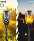 Solar Torch Lights With Flickering Flame 16 Pack 12 LED Outdoor Landscape Lighting Tiki Torches in charging and working mode