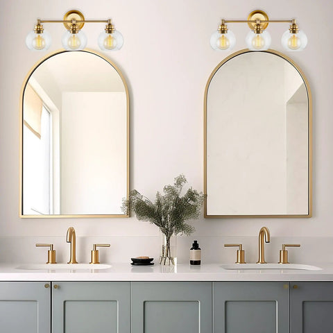 22 Inch Modern Three Light Vanity Bathroom Light With Clear Glass Globe Shades And Warm Brass Finish For Rustic Farmhouse Vibe And A Sharp Stylish Powder Room Glow