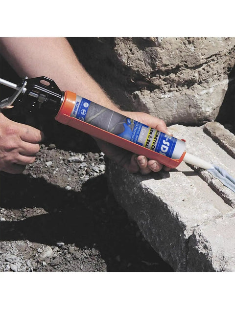 Applying Concrete Crack Filler For Outdoors Waterproof Sealant, Self Leveling Driveway Repair Patch with caulking gun on crack.