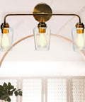 Mid Century Inspired Vanity Light With Three Snifter Glass Shades In Antique Nickel Finish Damp Location Rated And Mounts Up Or Down