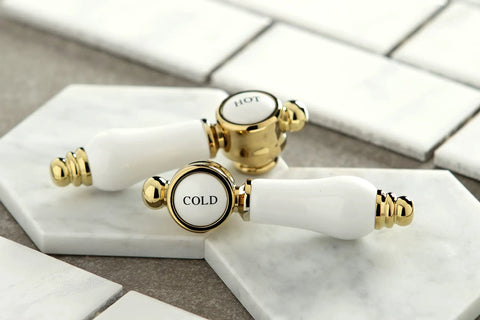 Porcelain and brass hot and cold faucet handles for 4 Inch Centerset Bathroom Faucet In Polished Brass With Drip Free Ceramic Disc Cartridge Deck Mount 3 Hole Install 1.2 GPM At 60 PSI Half Inch IPS Connection Classic Victorian Style For Elegant Bath Renovation.