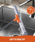 Rubber Floor Squeegee Heavy Duty With Extendable Handle being rinsed in a kitchen sink, showcasing aluminum base.