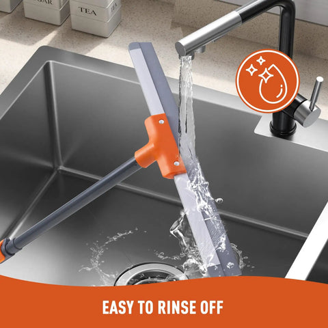 Rubber Floor Squeegee Heavy Duty With Extendable Handle being rinsed in a kitchen sink, showcasing aluminum base.