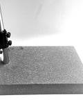 Side view of granite check with fine adjust and metal clamp on a 12 x 8 x 2 in granite block