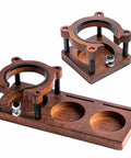 Adjustable Espresso Tamping Station Built From Premium Sapele Wood Handles 51-58mm Portafilters with unique design on kitchen countertop.