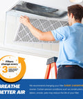 Person installing MERV 10 20x20x1 Pleated Air Filter Six Pack For AC Furnace And HVAC Systems Made In USA Removes Odor Mold Bacteria
