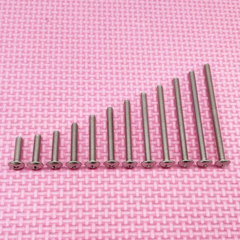 25 Pack M4 x 65mm Machine Screws For Cabinet Knobs And Drawer Pulls, 304 Stainless Steel, Phillips truss head on pink background