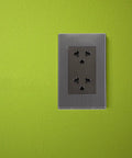 Heavy Duty Stainless Steel Six Hole Wall Socket Faceplate For Home And Office High Current Power Outlet Cover with grey background.