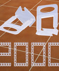 Pro Grade Tile Leveling Clips Kit 1400 Pcs For Ceramic And Stone Tile Installations with plastic spacers on tiles