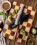 Kiritsuke Knife Cover With Walnut Magnetic Sheath For 10 Inch Blades on checkered board with vegetables