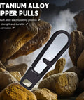 Two Pack Heavy Duty Titanium Zipper Pull Replacements For Backpacks Luggage Jackets And Outdoor Gear Ultra Durable Easy To Install Universal Fit Black shown among rocks