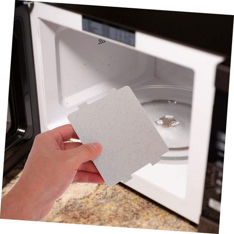 Person holding 10 Pack High Temperature Mica Sheets For Microwave Ovens Heat Resistant Waveguide Cover And Insulation Shield