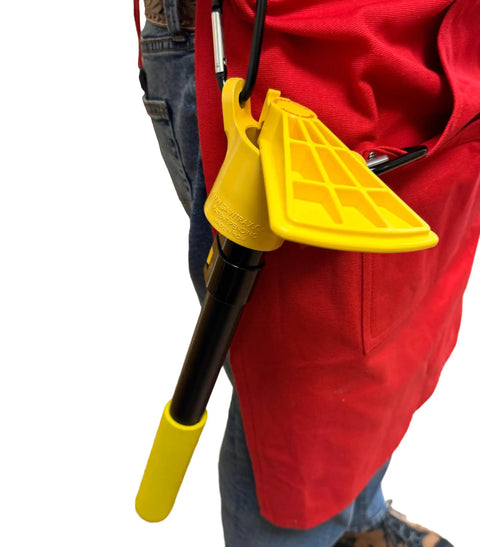 Keep Your Reach Tools Right At Hand With This Durable Wearable Holster Snaps Quickly Onto Belt Loops, showcasing yellow clip holding reach tool.
