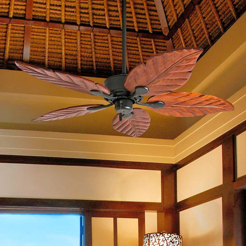 52 Inch Tropical Indoor Ceiling Fan With No Light And Pull Chain Three Mounting Options Hand Carved Wooden Leaf Blades In Bronze Finish Great For Medium To Large Rooms Up To 400 Sq Ft Big Room Breeze, shown installed in an elegant room.