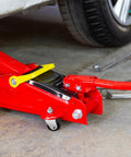 Heavy Duty Floor Jack Casters Set For 3 Ton Jacks With Cast Iron Wheels Replacement Parts Fits 12mm Stem installed on floor jack