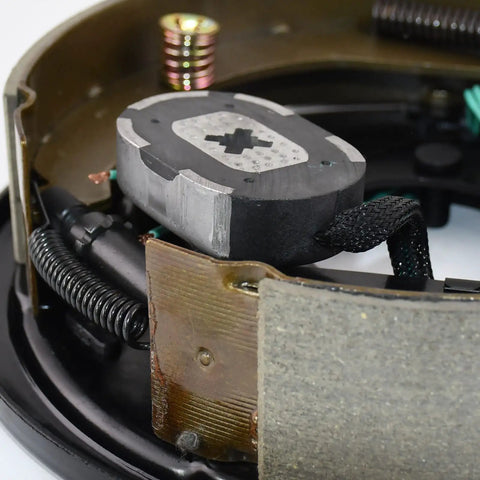 Close-up of Heavy Duty 10 Inch Right Side Electric Trailer Brake Assembly Solid Steel Drum components and wiring.