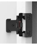 Two Pack Half Inch Self Closing Spring Hinges For Kitchen Cabinets And Furniture Hardware Matte Black Semi Hidden Design Soft Close No Fuss Install Upgrade Reliable Quiet Operation For Smooth Cabinet Upgrades installed on white cabinet door