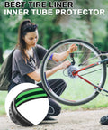 Woman installing Road Bike Tire Liner Set Pair For Two Tires TPU Flat Protector Compatible With 700C 27 27.5 28 Inch Road Tires