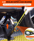 2.5 Ton Universal Scissor Car Jack Kit With Portable Tire Changing System lifting a vehicle, wrench in use