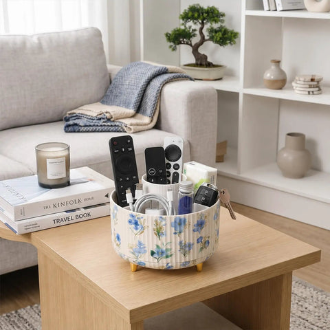 360 Degree Swivel Desk Organizer With Floral Compartments on wooden table in living room, holding remote controls and small items.