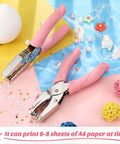 Two Piece Handy Handheld Paper Punch Set With Heart And Star Holes Durable Metal Punches on decorative surface