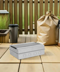 Heavy Duty Weatherproof Outdoor Electrical Box With Reinforced Breaker Panel Cover on wooden patio protecting wiring from elements.