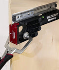 Ultimate Cabinet Jig Bundle For DIYers with drawer slide jig installed on wooden cabinet demonstrating use.
