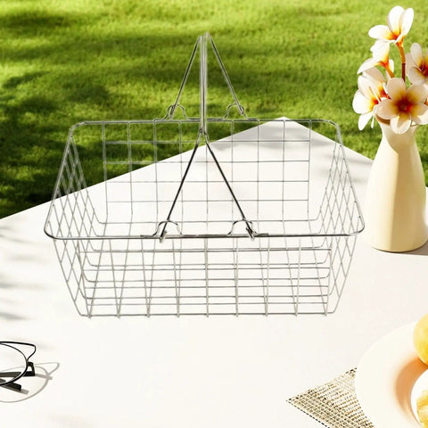 Heavy Duty Iron Shopping Basket With Cushioned Ergonomic Handle Straight Up Durable Grocery Tote For Home Market And Kitchen Runs No Sweat Heavy Load Errand Caddy placed on a table outdoors.