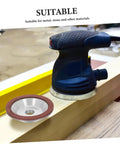 Pro Diamond Cup Grinding Wheel 100mm Silver Concave Bowl on a workbench with sander, suitable for shaping various materials.