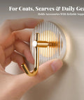 Kick Clutter To The Curb With This Slick Space Saving Wall Hook designed for entryways; features a striped acrylic plate and gold metal hook.
