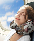 Woman using U Shaped Neck Pillow For Travel And Office Napping Reusable Lightweight Multi Functional Cushion For Airplane Train And Car Rides Soft Durable Polyester Fabric Cozy Travel Buddy For Pitbull Dog Lovers on airplane