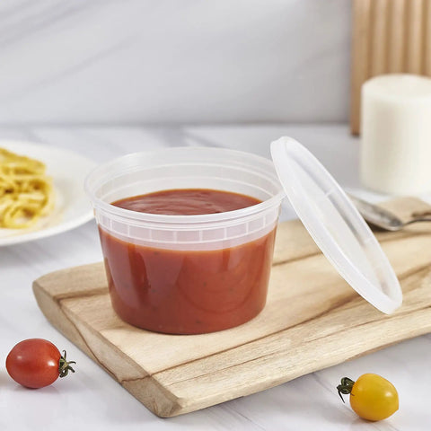 16-Ounce To-Go Food Storage Containers with lids, BPA free, filled with tomato soup on wooden board, microwave safe