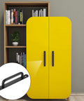 Two Pack Barn Door Handles Set Sliding Door Pulls Stainless Steel With Black Finish And Plates installed on yellow cabinet