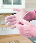 Cut Resistant Kitchen Gloves Level 5 Food Grade Protection For Safe Food Prep Small Pink HPPE Gloves being worn