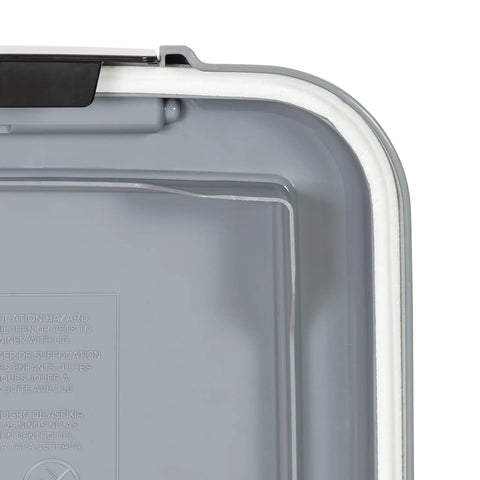 Close-up of Airtight Pet Food Storage Container With Scoop Big 69 Quart Capacity showing snap lock latch and strong seal in gray.
