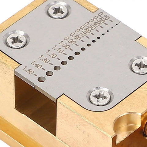 Close-up of Brass Watch Repair Vise Clamp Kit With 0.2-1.5mm Hole Range, showing measurement plate and screws