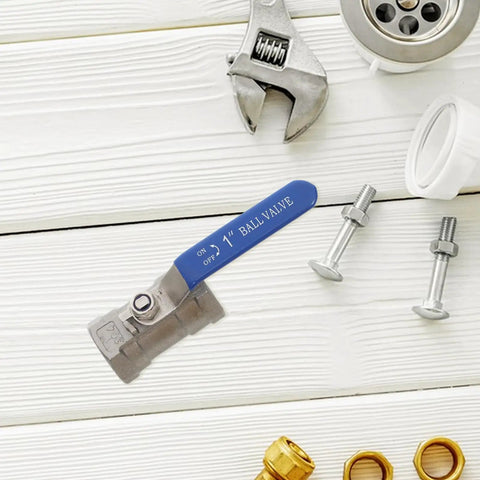 Premium Stainless Steel Ball Valve With Internal Thread Manual Shutoff For Residential Plumbing Leak Free Male Threaded Pipe Connector on a wooden surface.