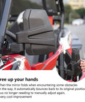 Auto Reset UTV Side Mirrors for 1.5 to 2.0 Inch Roll Cages installed on red UTV, brushed obstacle resistance feature shown