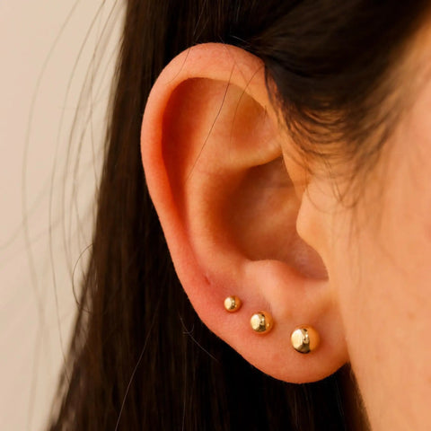 Extra Long Post Earrings Set, 5 Pairs 316L Stainless Steel Ball Studs For Women And Men, Hypoallergenic And Nickel Free, 2-6mm, Lead Free, Waterproof All Day Comfort For Sensitive Ears, Steel Color. Gold ball studs worn in ear lobe