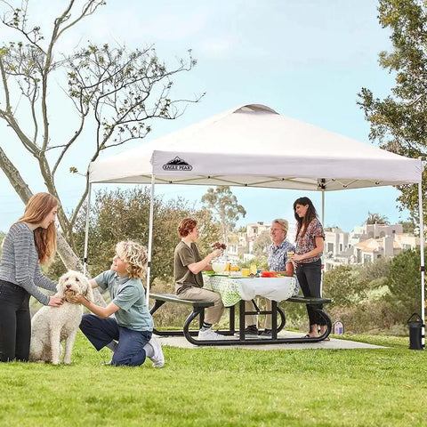 10x10 Foot Pop Up Canopy Tent With Wheeled Carry Bag, Easy One Person Setup, white tent over picnic table, family gathering outdoors