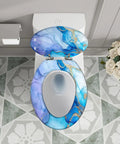 Toilet Seat Cover Elongated Quiet Close for Bathroom in blue and gold marble design above white toilet with flowers.
