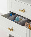 Champagne Bronze Cabinet Knobs 2 Inch T Bar Knurled Pulls 10 Pack on white drawers, showcasing modern furniture use.