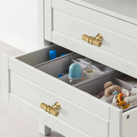 Champagne Bronze Cabinet Knobs 2 Inch T Bar Knurled Pulls 10 Pack on white drawers, showcasing modern furniture use.
