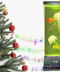 Jellyfish Lamp With Bluetooth Speaker And White Noise Night Light For Kids And Adults beside festive Christmas tree with musical notes.
